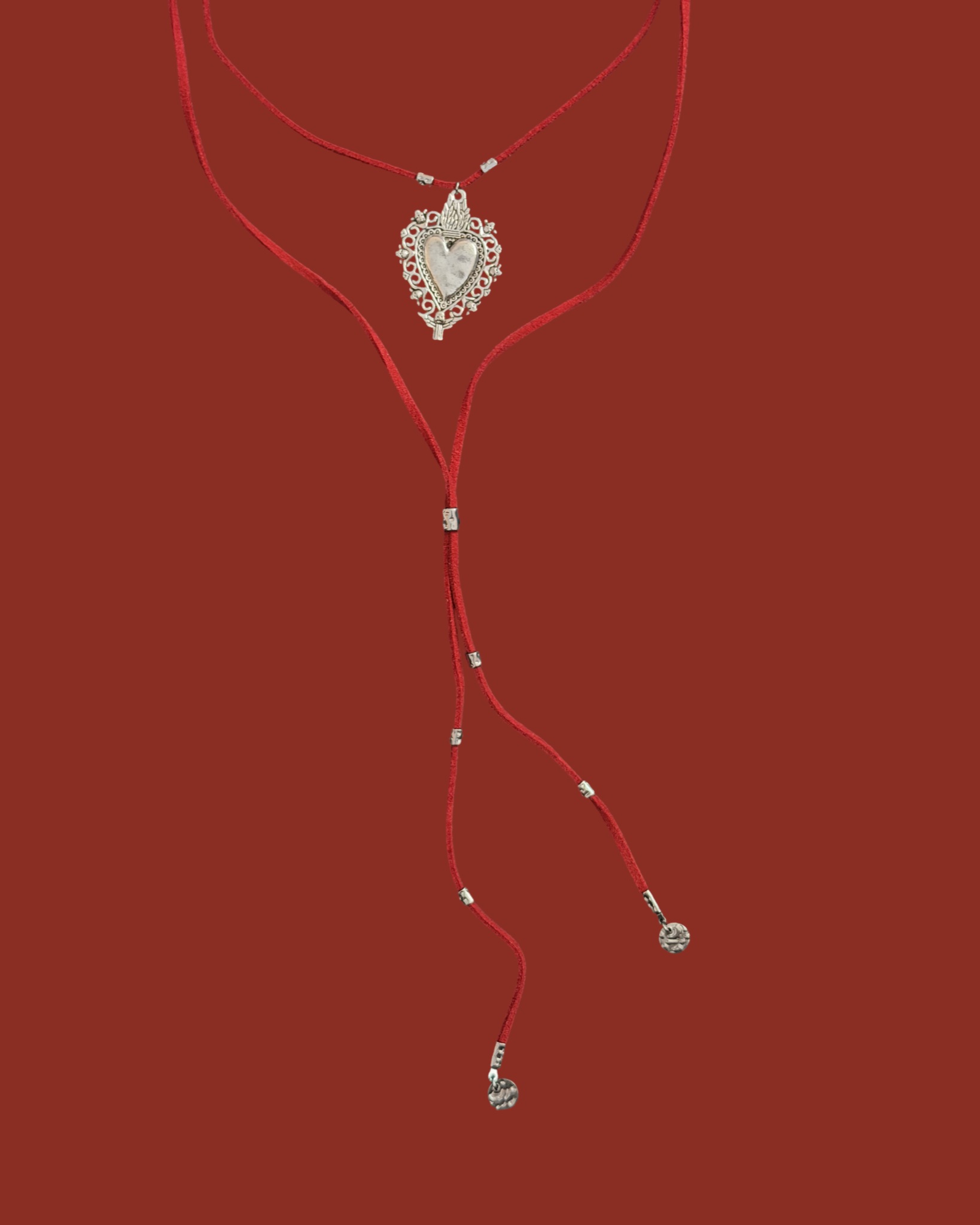 Foto della collana Cravattino cuore sacro rosso, categoria Cravattino
